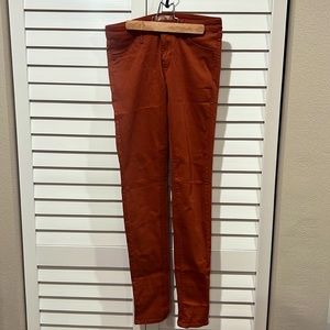 Burnt orange Uniqlo Stretch jeans 26x33